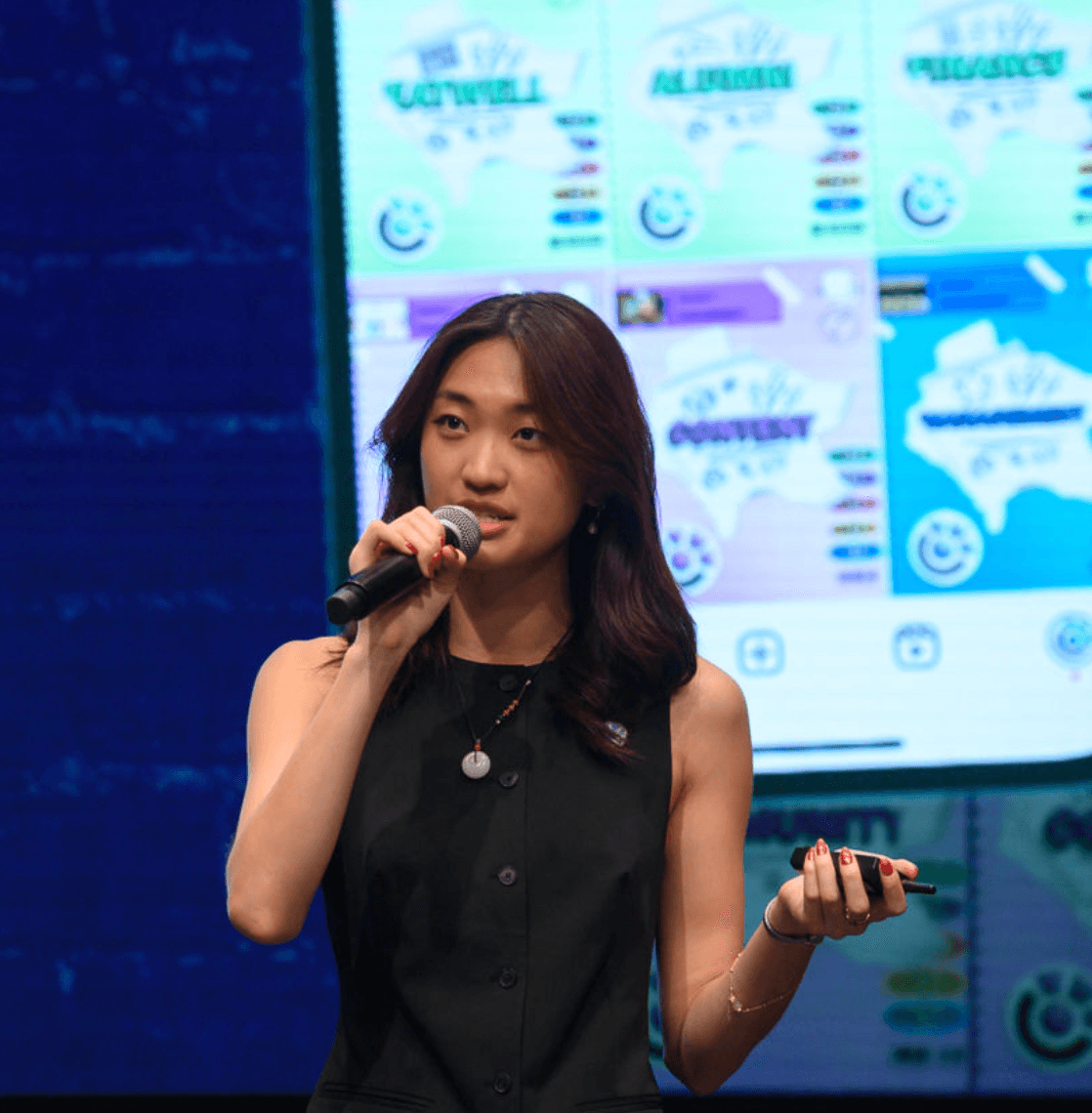 Katherine speaking on stage